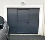 Porte de garage sectionnelle avec portillon intégré
