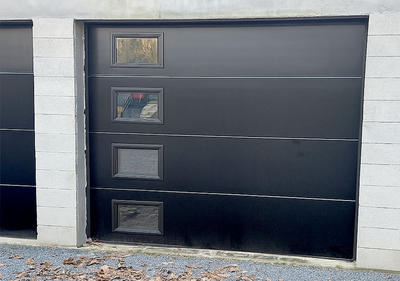 Porte de garage sectionnelle lisse noir ral 9005 motorisée
