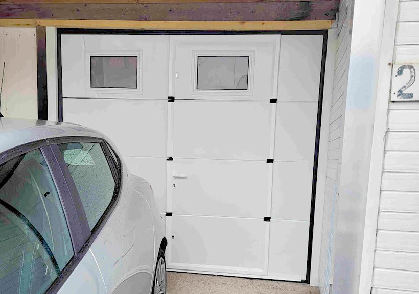 Porte de garage sectionnelle lisse blanc